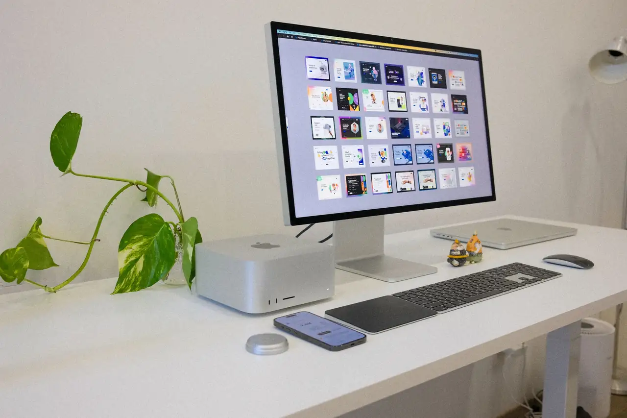 Contemporary minimalist creative workspace with high-end digital design displays