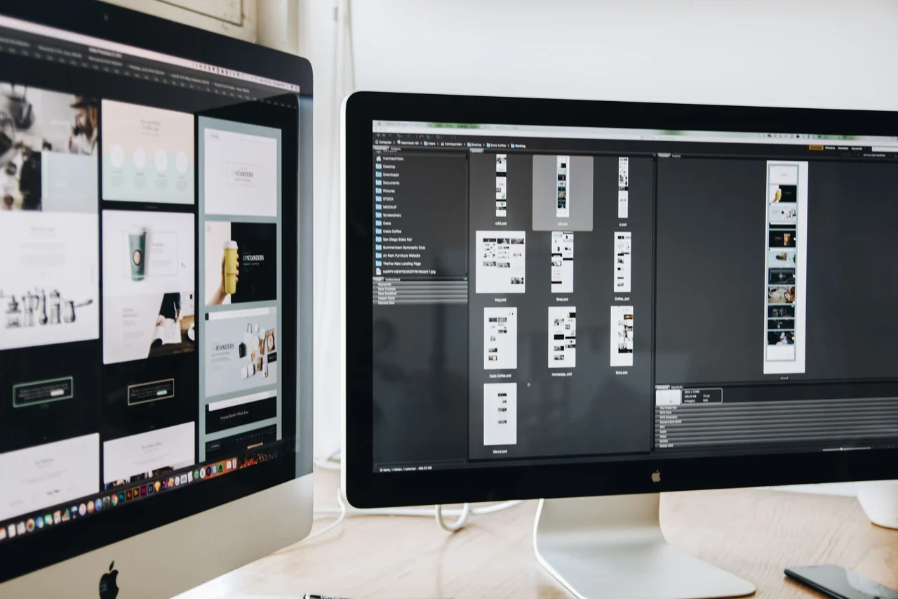 Dual monitor workspace displaying UI design assets and button states